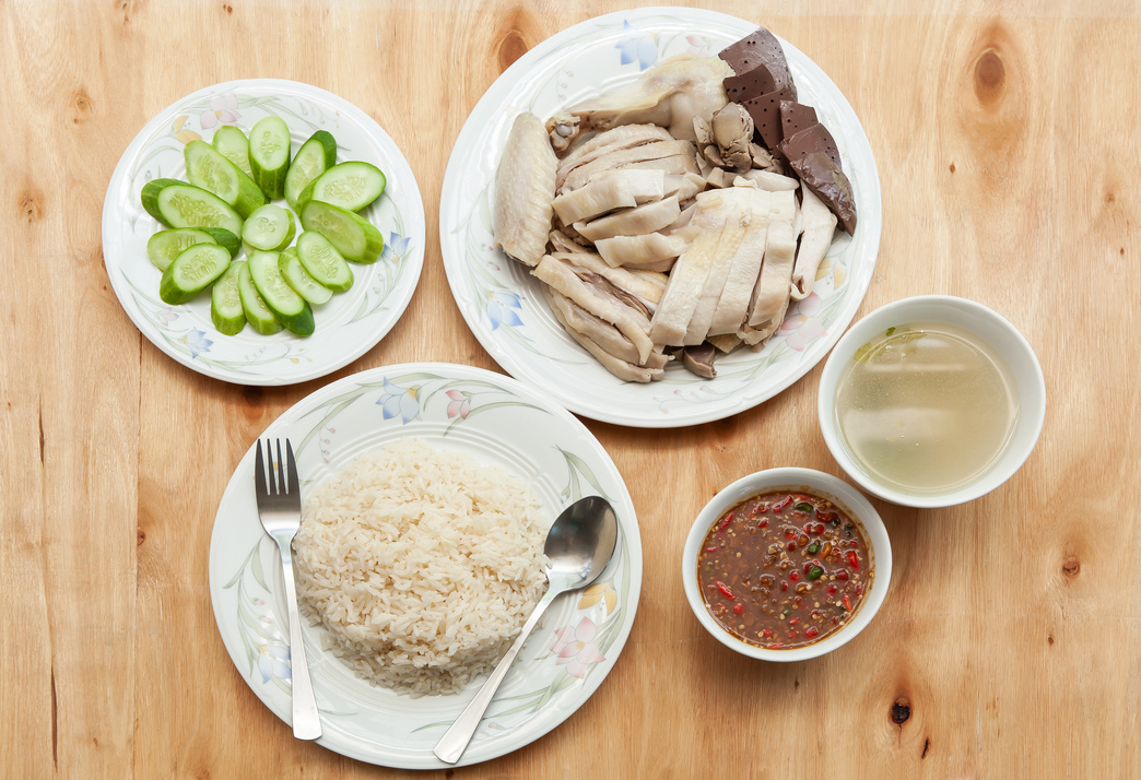 Hainanese chicken rice, Khao Man Gai set on wood table, Thai food background